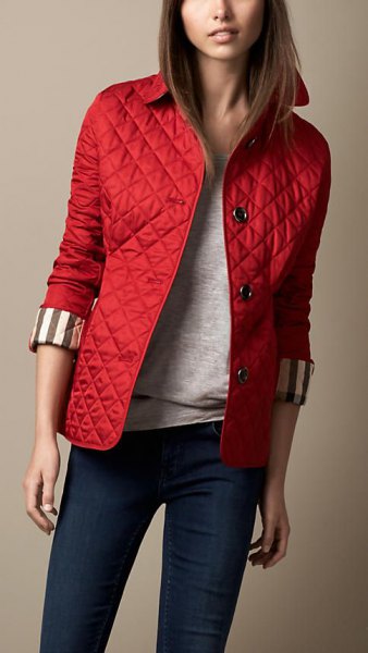 red quilted jacket, dark blue skinny jeans