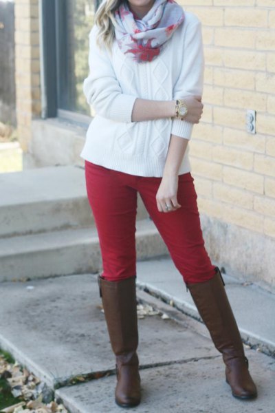 red breeches and white cable knit sweater