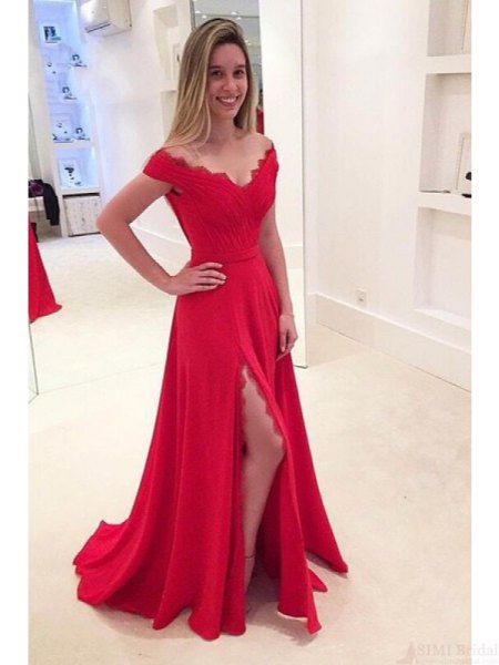 red, scalloped dress with wide V-neck and high, floor-length, split dress