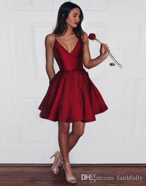 red silk with deep V-neckline and flared mini dress with pink heels