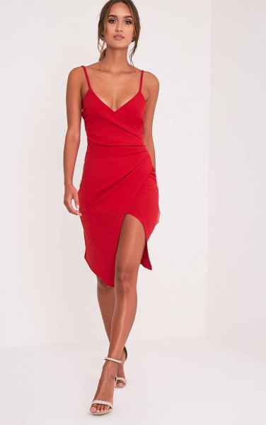 red wrap dress with deep V-neckline and spaghetti straps