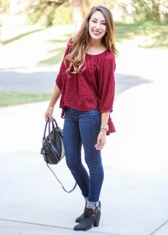 red jeans with three-quarter sleeves and blouse cuffs