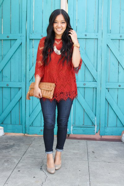 red lace top with three-quarter sleeves and silver necklace
