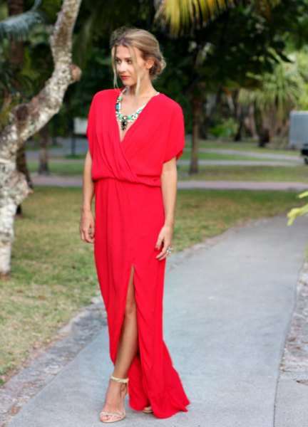 red short-sleeved wrap dress with V-neckline and boho necklace