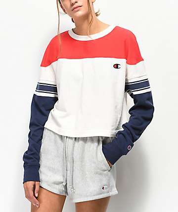 red, white and dark blue color block sweatshirt with gray shorts