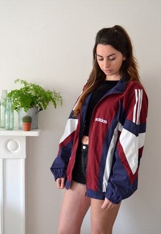 Red, white and navy blue vintage windbreaker with black mini denim shorts