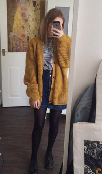 ribbed dark mustard sweater jacket with blue denim button on the front skirt
