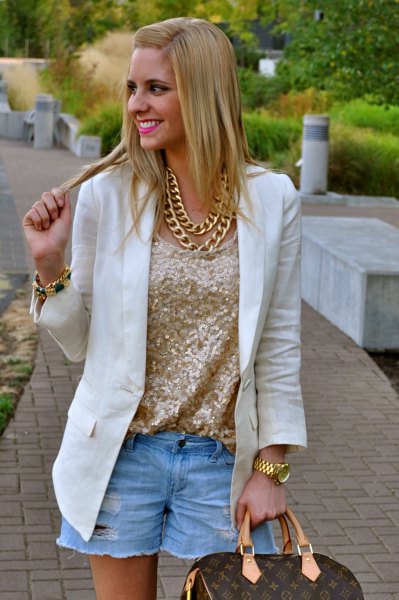 rose gold metallic blouse with white blazer and light blue denim shorts