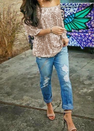 Rose gold sequin blouse with one shoulder and boyfriend jeans