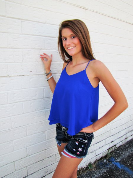 Royal blue, flowing tank top with black embroidered mini denim shorts