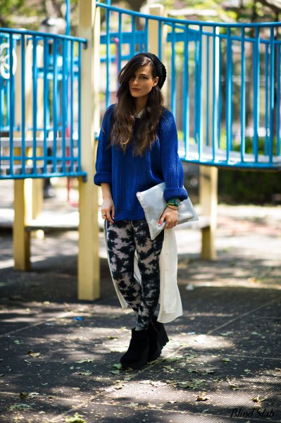 Royal blue blouse with relaxed fit and black and white leggings