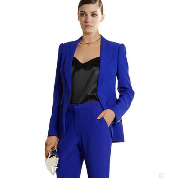 Royal blue suit with black, low-cut silk blouse