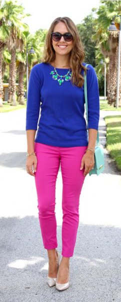 royal blue three-quarter sweater with pink ankle jeans