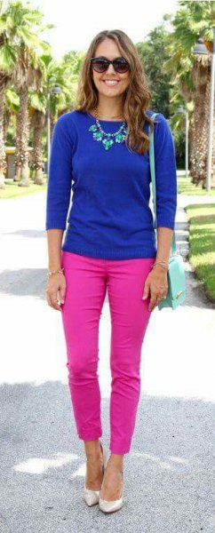 Royal blue three-quarter sweater with pink slim fit jeans