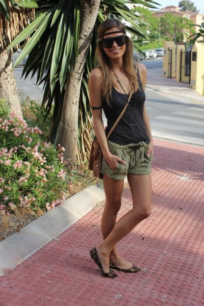 Tank top with scoop neckline and green mini-shorts