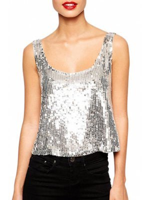 Sequin tank top with a scoop neckline and black skinny jeans
