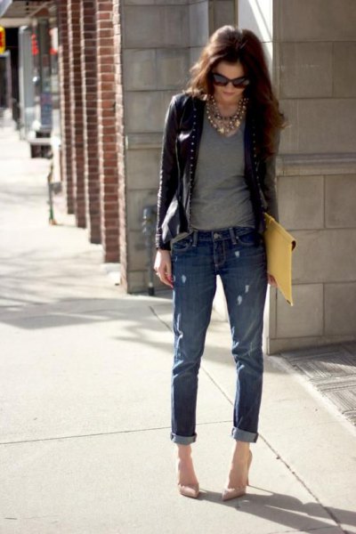 short leather jacket with gray t-shirt with scoop neckline and jeans with cuffs