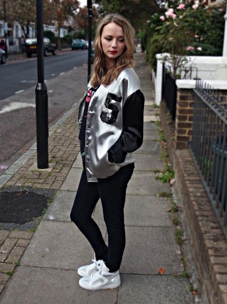 silver and black metallic bomber jacket with white sneakers