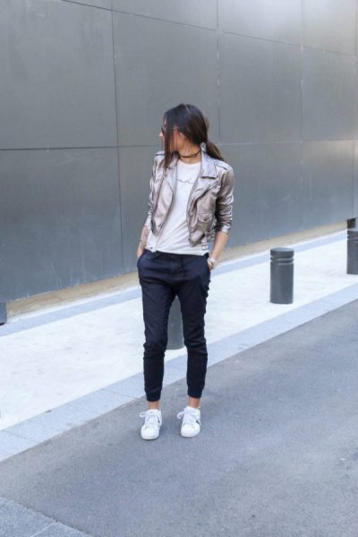 silver blazer with black, cropped jogger jeans and white sneakers