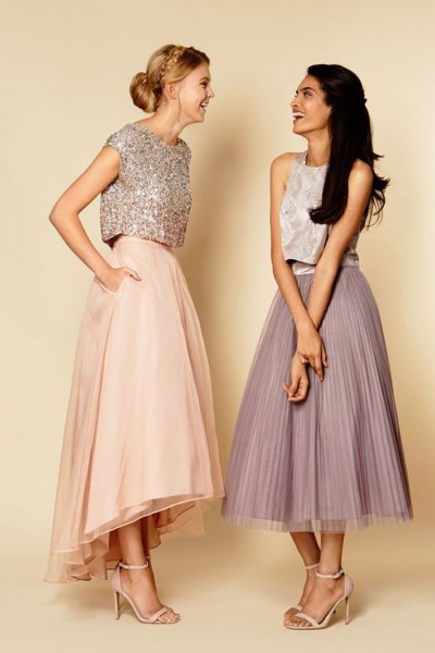 silver top made of sequins with cap sleeves and light pink maxi skirt