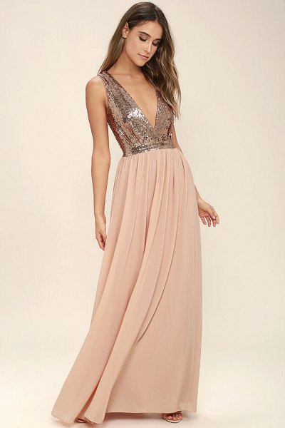 silver sequin top with deep V-neckline and floor-length pleated skirt made of red chiffon