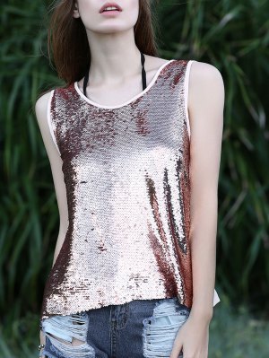 silver sequin tank top with scoop neckline and heavily ripped jeans