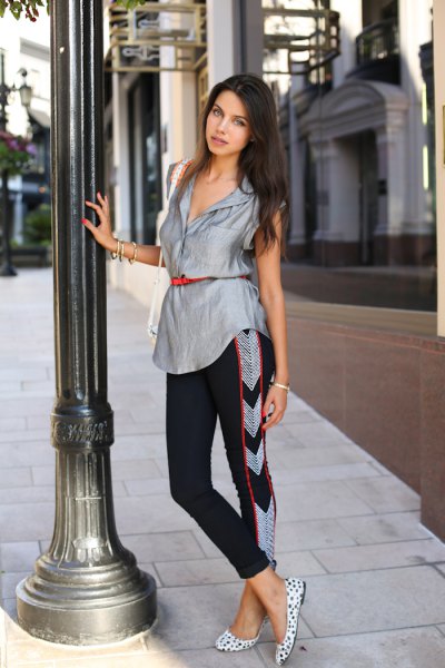 silver sleeveless belt blouse with black, shortened trousers
