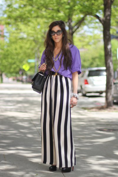 sky blue blouse with black and white striped trousers with wide legs