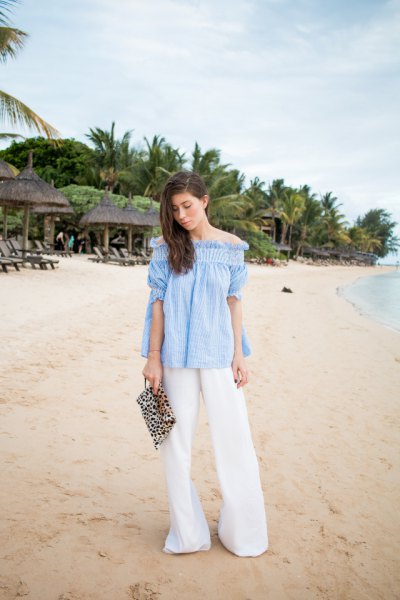 sky blue off-the-shoulder blouse with white palazzo pants