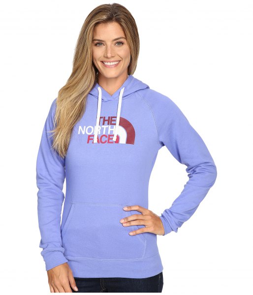 Sky blue sweater North Face hoodie with dark skinny jeans