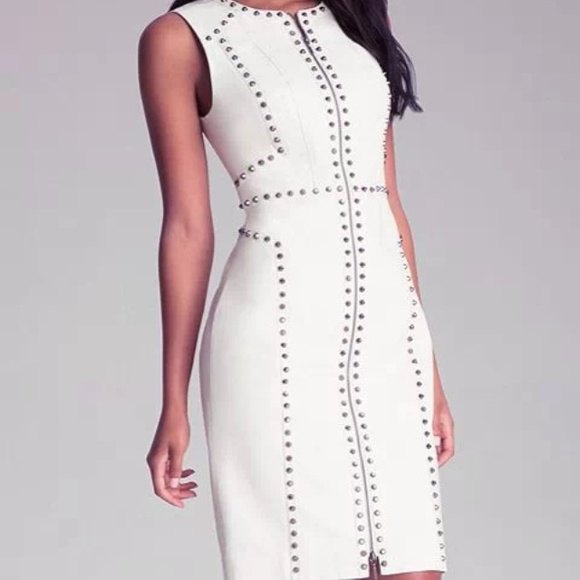 sleeveless, figure-hugging, white leather dress with rivets