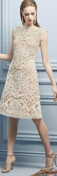 sleeveless cream-colored midi lace dress