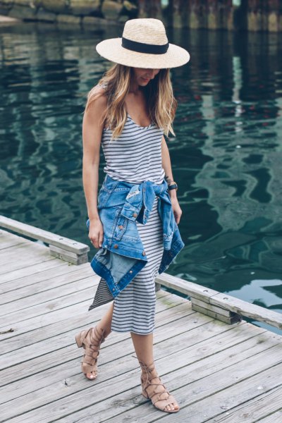 Navy straw hat and white striped leather midi dress