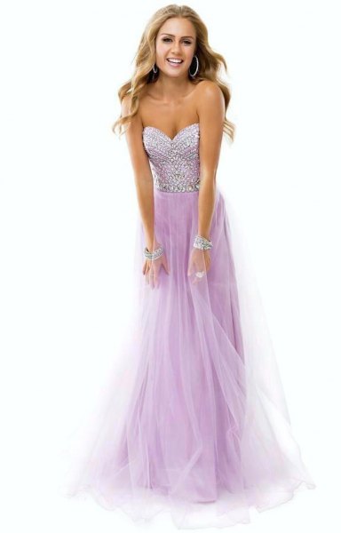Sweetheart Fit and Flare floor-length tulle dress with a silver sequin cuff bracelet