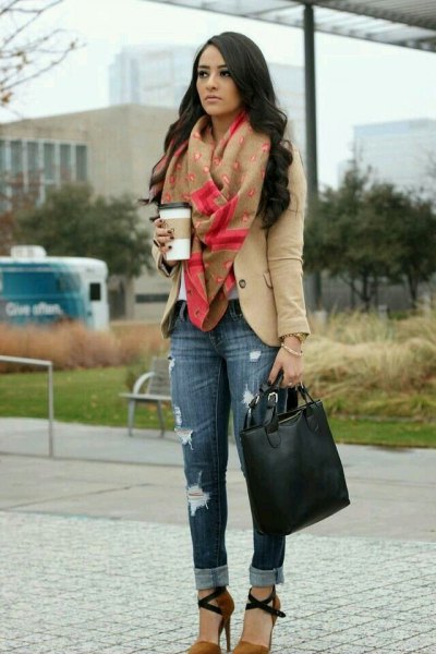 Light brown blazer with a green scarf and slim fit jeans with cuffs