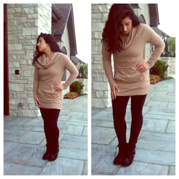 Light brown tunic sweater with cowl neckline and black leggings