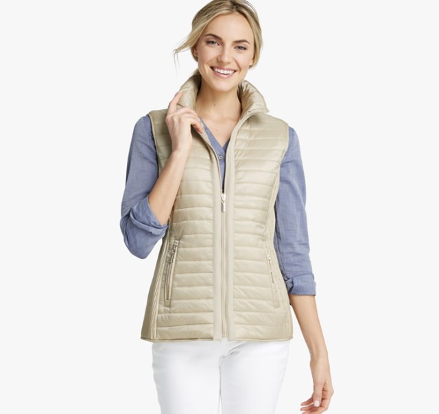 light brown quilted vest over jeans