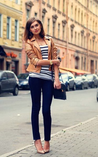 Tank leather jacket with black and white striped T-shirt and dark skinny jeans