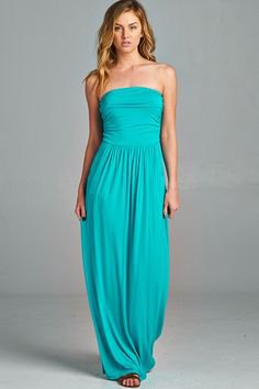 Blue-green fit and a flared maxi dress with open toe heels