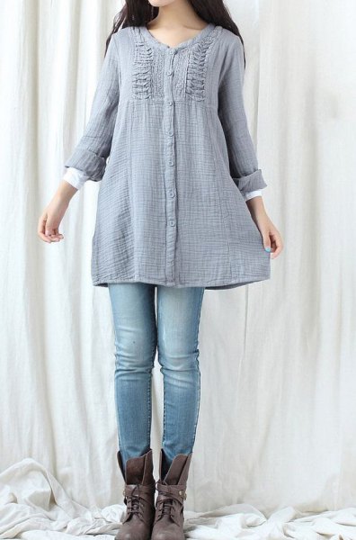 blue-green tunic top made of gathered cotton with light blue jeans