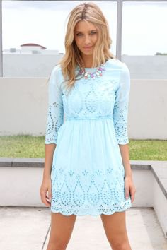 Three-quarter sleeve fit and flared mini dress made from boho lace
