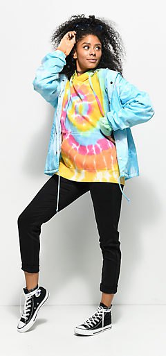 Brightly colored sweatshirt with a light blue windbreaker