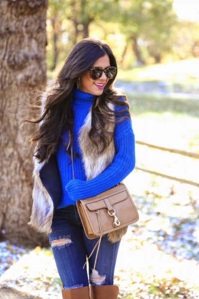 ribbed turtleneck with blue jeans and brown boots above the knee
