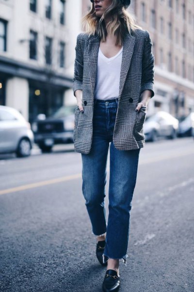 Tweed blazer with a white V-neck t-shirt and blue straight-leg jeans