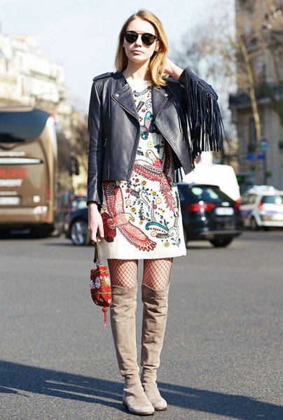Wear white printed t-shirt dress with black leather dress