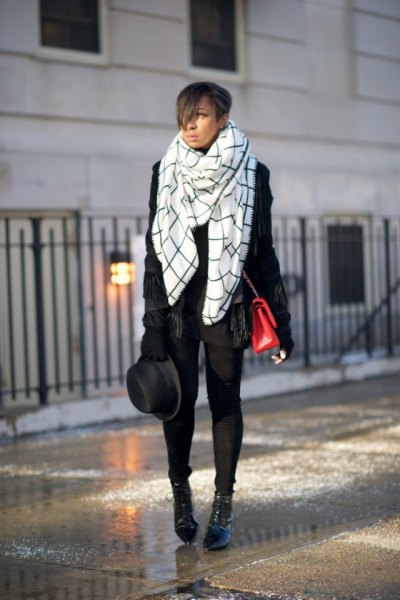 white and black checkered blanket scarf with leather jacket