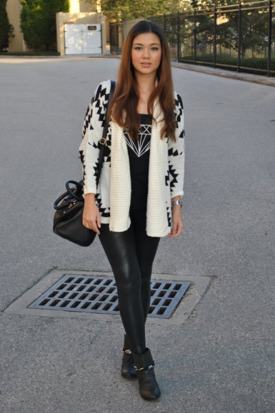 white and black printed blazer with leather gaiters