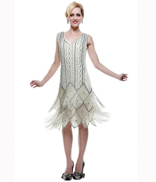 white and black sequin dress with pearl fringes