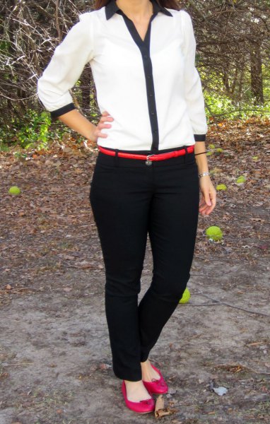 white and black shirt with chinos and a narrow belt