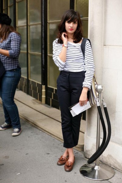 white and black striped long-sleeved T-shirt with black, short-cut chinos